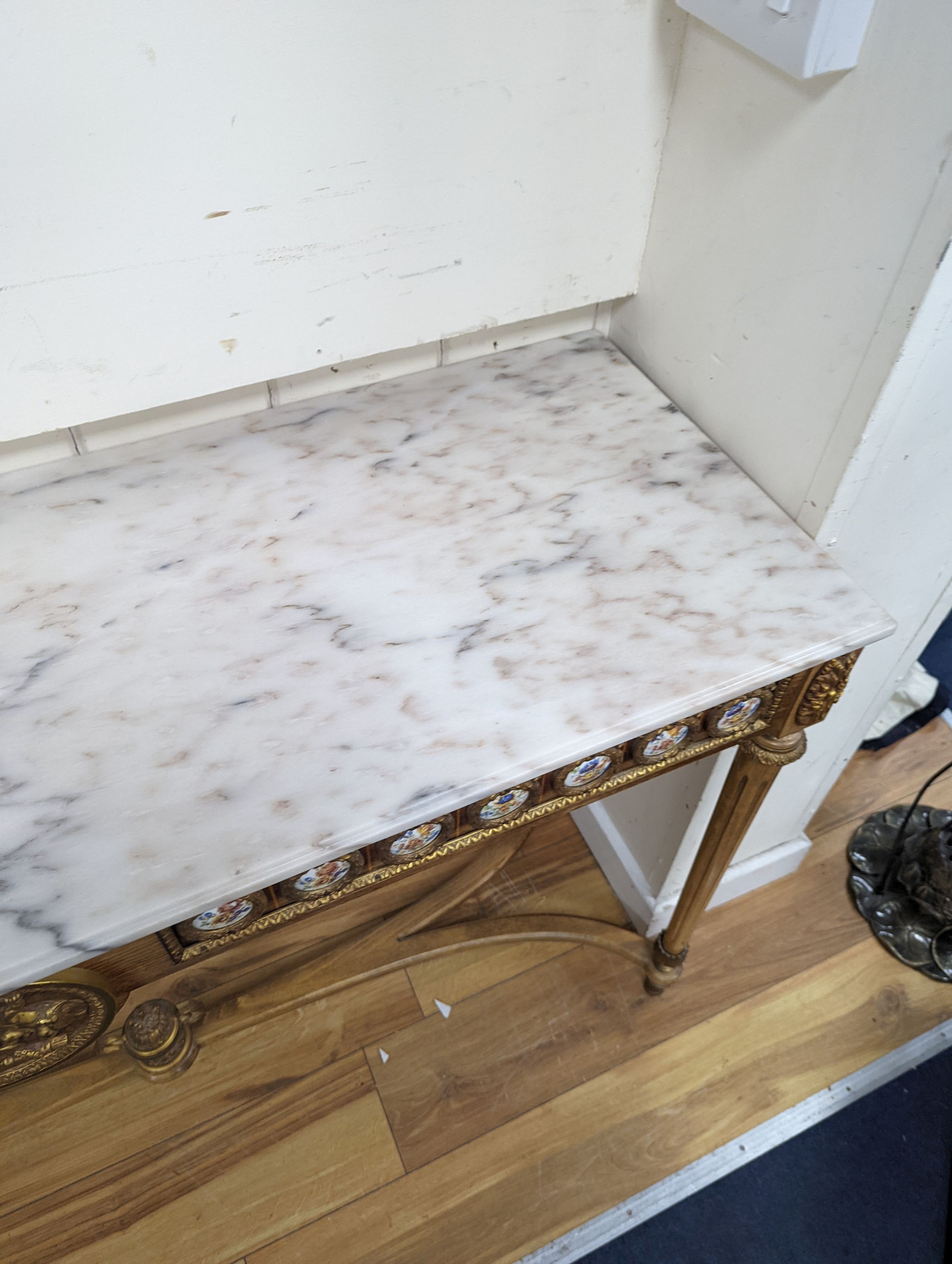 A Louis XVI style gilt metal and marble top console table, width 133cm, height 81cm